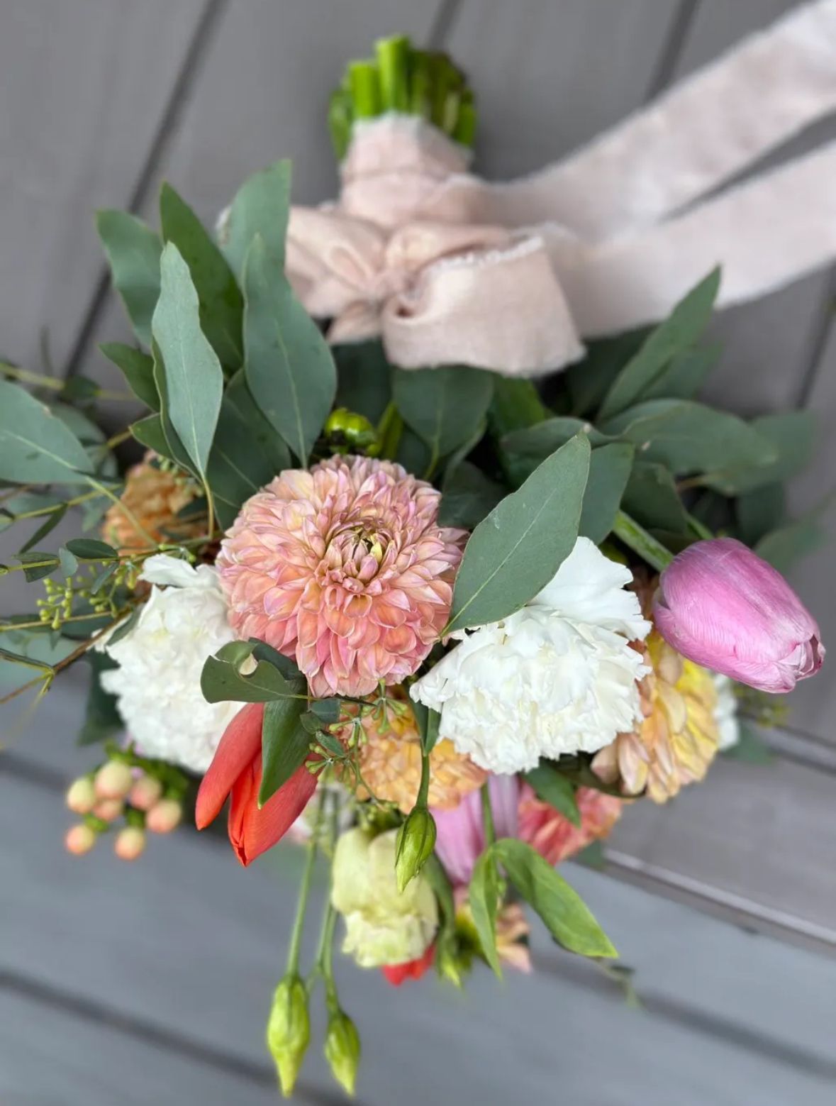 Dahlia peach bridal bouquet with ribbon